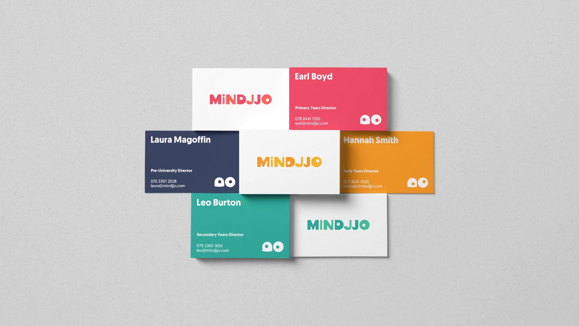 Colourful Mindjjo branded business cards using the new colour palette.